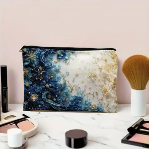 Vue detaillee de la trousse de maquillage en toile avec motif flocon d'or bleu et blanc.