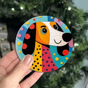 Close-up detail of colorful silicone dog coaster, featuring vibrant art design and non-slip base.