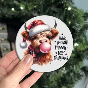 Detailed close-up view of cute Highland cow Christmas silicone car cup coaster item