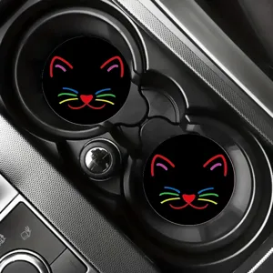 Silicone car cup coaster detail view, featuring a cute neon cat face design for auto interior.