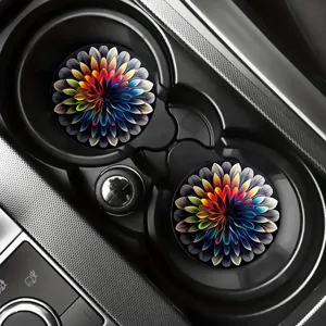 Close-up of colorful mandala silicone car coasters placed neatly inside a car cup holder.