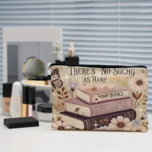 Pochette de maquillage en toile littéraire vintage avec livres empilés et motif floral.
