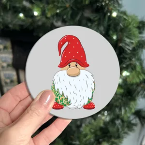 Close-up of cute Christmas gnome car coaster with red hat, anti-slip mat design.