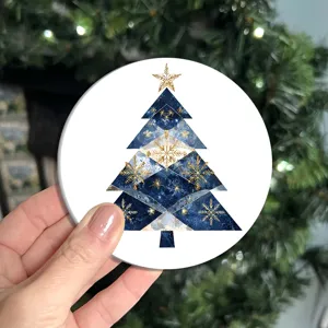 Round Christmas tree coaster, blue gold geometric holiday table mat, festive home decor.