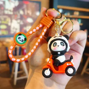 Porte-clés pendentif moto panda de dessin animé mignon, sangle de corde tressée orange élégante.