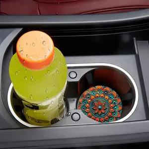 Detailed view of a round car cup holder coaster featuring an intricate mandala floral pattern.