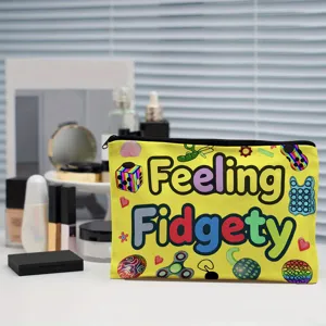 Κίτρινη τσάντα μακιγιάζ από καμβά με τύπωμα fidget toys, και φερμουάρ, χαριτωμένη.