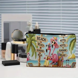 Canvas cosmetic bag with cute flamingo print, versatile travel toiletry pouch for women.