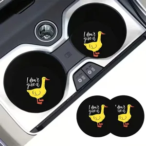 Car cup holder coaster detail showing funny yellow duck design and anti-slip silicone material.