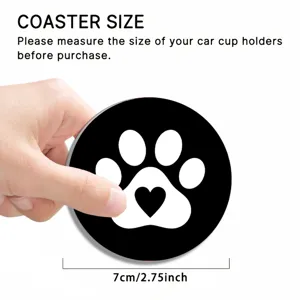 Car coaster detail view showing size and black silicone paw print design with heart.