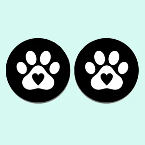 Cute silicone car coaster featuring a black and white paw print with a sweet heart design.