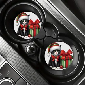 Car cup coasters featuring cute Christmas cat and gift box design placed in vehicle holder.