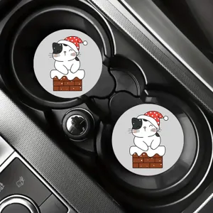 Close up of cute Christmas cat car coasters in cup holder, non-slip interior decor accessory