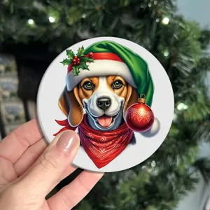Close-up detail shot of a round silicone Christmas coaster featuring a festive puppy design.