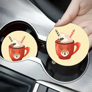 Christmas car cup coaster detail view, red reindeer mug design thermal pad in vehicle holder.