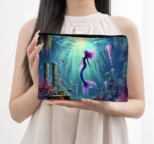 Canvas makeup bag featuring a colorful fantasy mermaid underwater art print for daily use and storage.