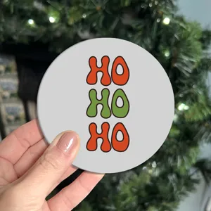 Cute Christmas HO HO HO car cup holder coaster, anti-slip rubber vehicle drink mat interior accessory.