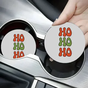 Car cup holder coaster detail view, non-slip silicone mat with cute holiday design for auto interior.