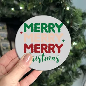 Christmas car cup coaster detail shot featuring festive merry text design for auto interior