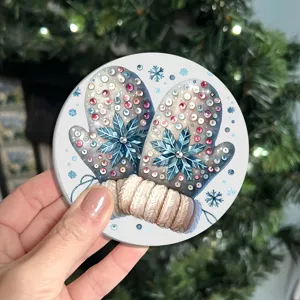 Winter snowflake mittens car coaster, decorative rhinestone cup mat for home or vehicle interior.