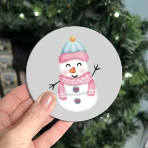 Silicone coaster detail view featuring a cute cartoon snowman design for holiday decor.