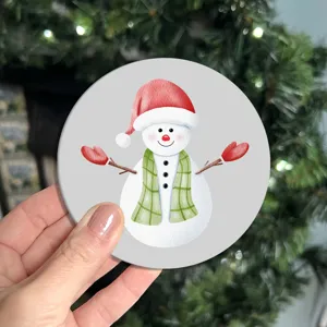 Cute snowman car coaster, non-slip rubber cup holder mat detail shot for vehicle interior decor.