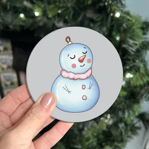 Cute cartoon snowman car coaster, non-slip silicone cup holder mat for auto interior decor.