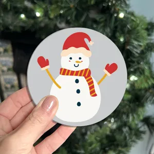 Close-up shot of cute cartoon snowman car coaster detail, nice holiday interior decor.