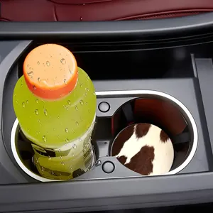 Cow print car cup coaster anti-slip silicone interior accessory detail closeup view