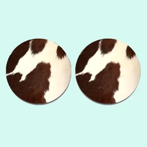 Set of 2 round brown and white cow print car cup coasters, anti-slip silicone drink mats.