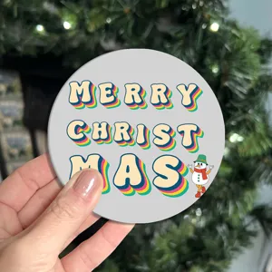 Christmas car coaster detail view, cute snowman non-slip cup holder mat interior decor.