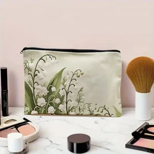 Lily of the valley print cosmetic pouch detail, portable fabric makeup storage bag.