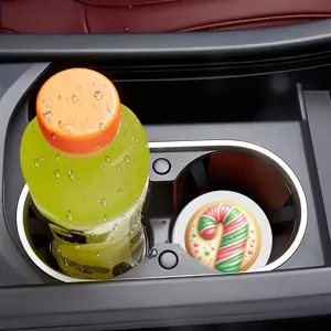 Festive candy cane car cup coaster detail view, non-slip silicone interior auto accessory.
