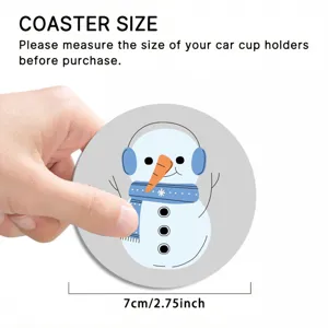 Close-up detail of the round car cup coaster featuring a cute cartoon snowman design with blue.