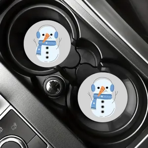 Detail view of cute cartoon snowman car coasters, round non-slip rubber mats for cup holders.