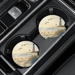 Sottobicchiere per auto rotondo antiscivolo assorbente con bellissimo motivo di faro spiaggia.
