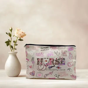 Detailed view of the cute nurse themed cosmetic bag, showcasing pink medical prints and black zipper.