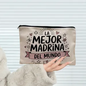 Detailed view of canvas makeup pouch with inspirational Spanish quote and cute printed motifs.