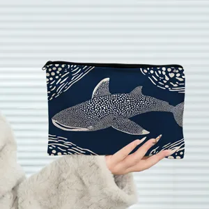 Stylish whale shark print cosmetic pouch with secure zipper for everyday makeup storage.