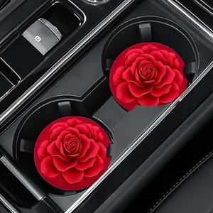 Detailed view of car cup holder coaster with red rose design, anti-slip silicone pad.