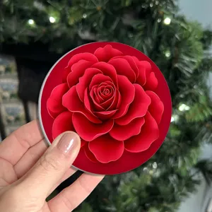 Detail view of round car cup coaster with red 3D rose, anti-slip and heat insulation.