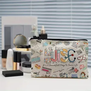Compact canvas cosmetic bag detail showing nurse theme medical pattern design and zipper closure.