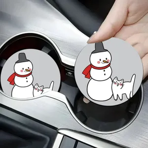 Detail display of the cute cartoon snowman and cat pattern car cup coaster in use.