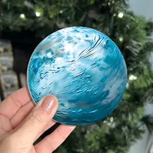 Round blue fluid pattern coaster, crystal velvet material, creative table decor, detail view.
