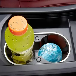 Creative round vortex cup mat coaster for car cup holder, stylish optical illusion design.