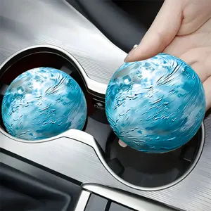 Round car cup holder coaster with blue vortex pattern, absorbent crystal velvet material.