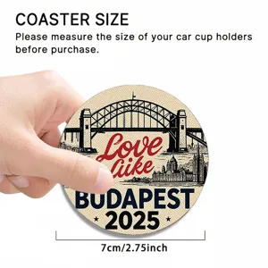 Close-up of a round car cup holder coaster with Budapest city print and dimensions.