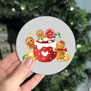 Christmas gingerbread man car coaster detail, festive ceramic cup holder mat close up.