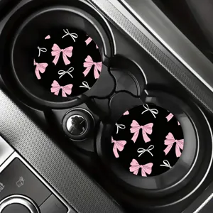 Simpatici sottobicchieri auto con fiocco rosa e bianco, tappetini rotondi antiscivolo.