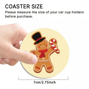 Detailed view of the festive gingerbread man car coaster showing size and cute design.